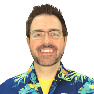 Photo of Eric Spellmann in a Hawaiian shirt.